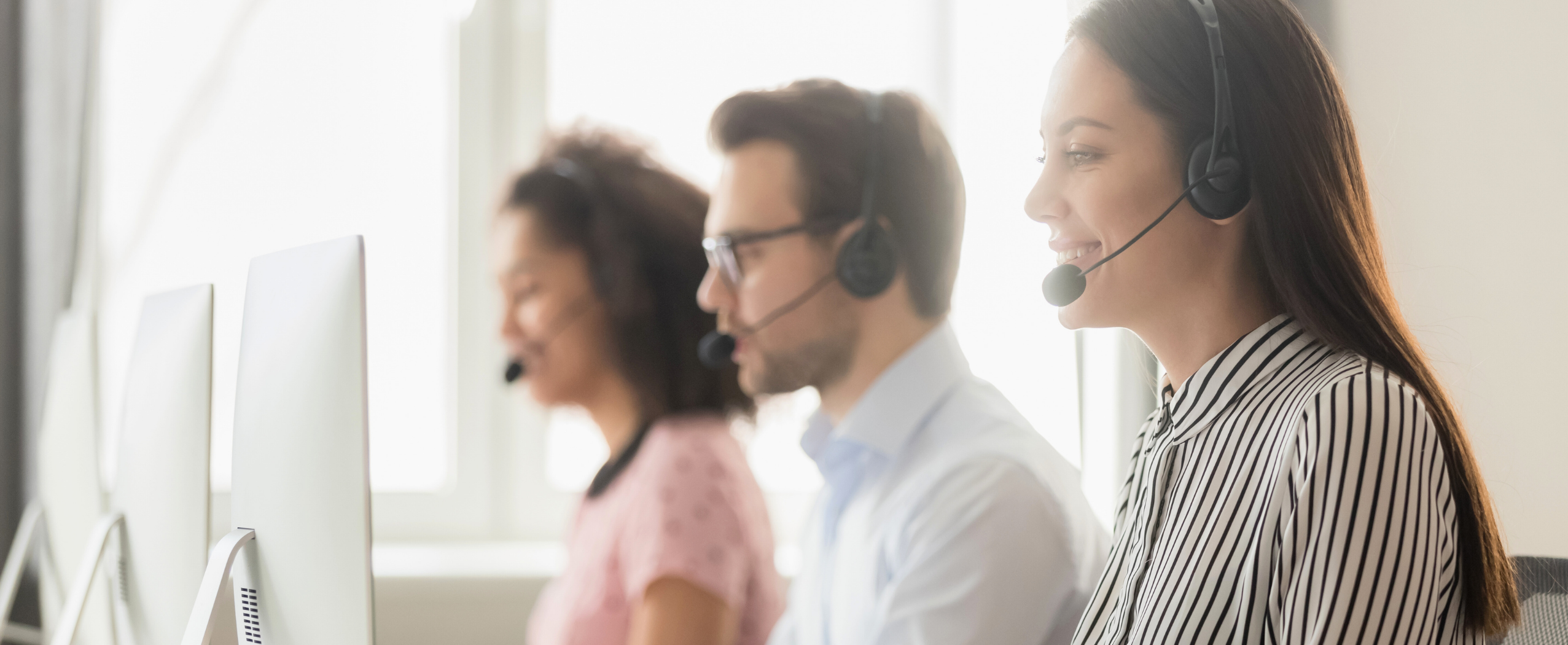 Customer support team wearing headsets representing GOLIVEA customer care, support, and communication.